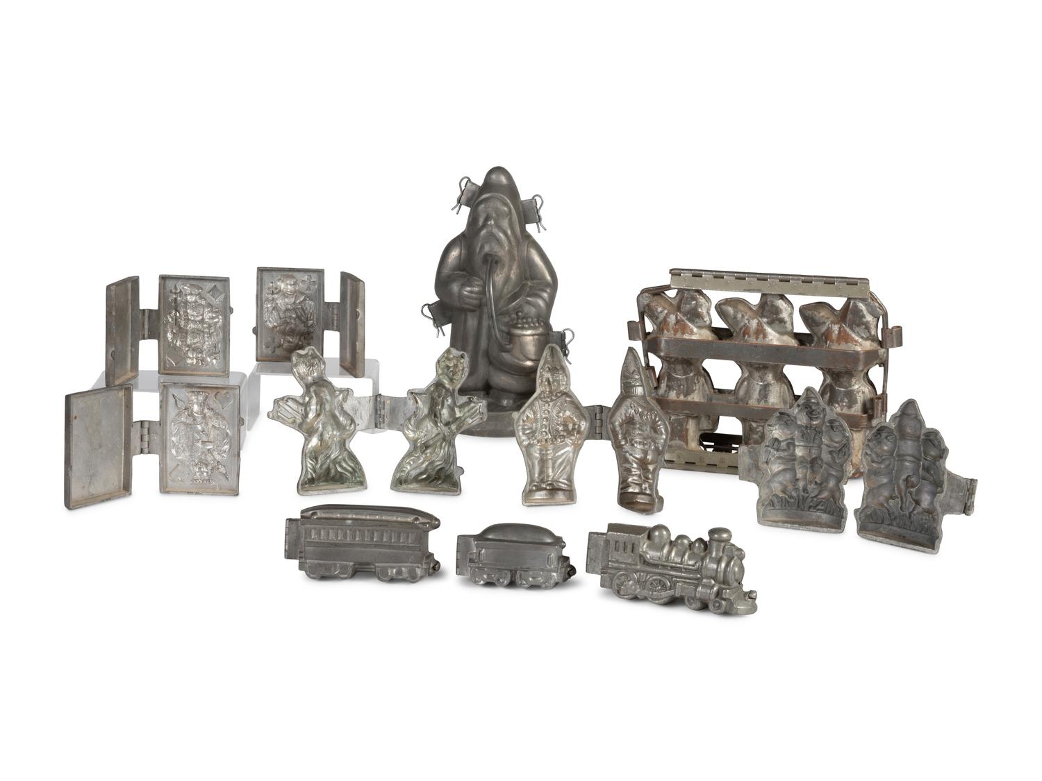 A Group of Pewter Figural Ice Cream and Candy Molds