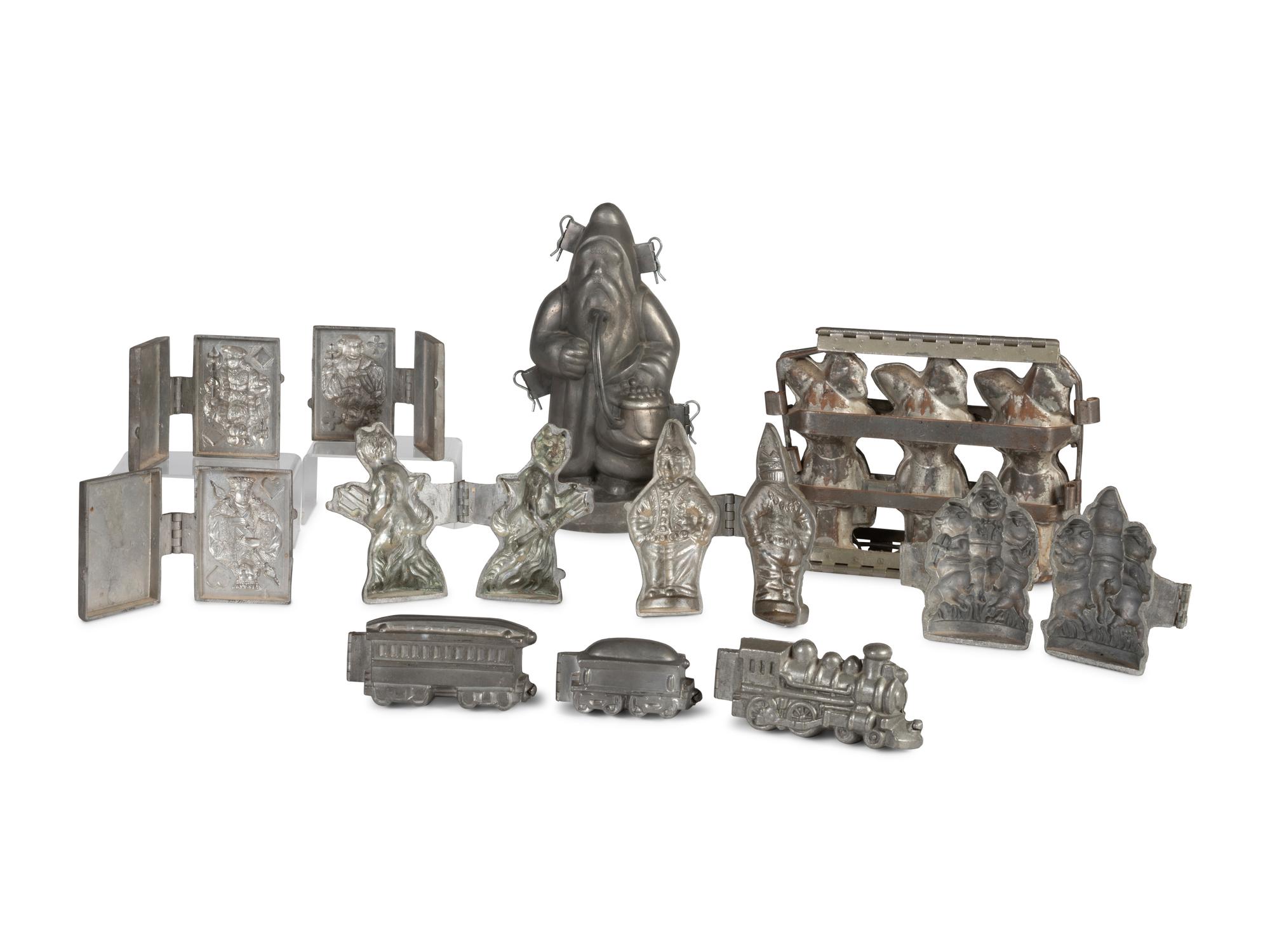 A Group of Pewter Figural Ice Cream and Candy Molds