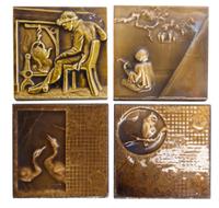 A Collection of Seven Pottery Tiles Height of tallest 12 1/4 inches.