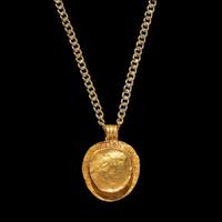 A Roman Gold and Onyx Cameo Pendant with Medusa — with a modern gold chain