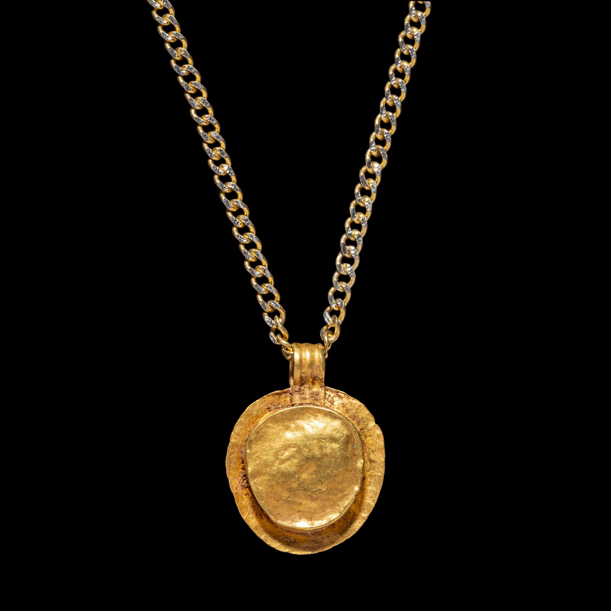 A Roman Gold and Onyx Cameo Pendant with Medusa — with a modern gold chain