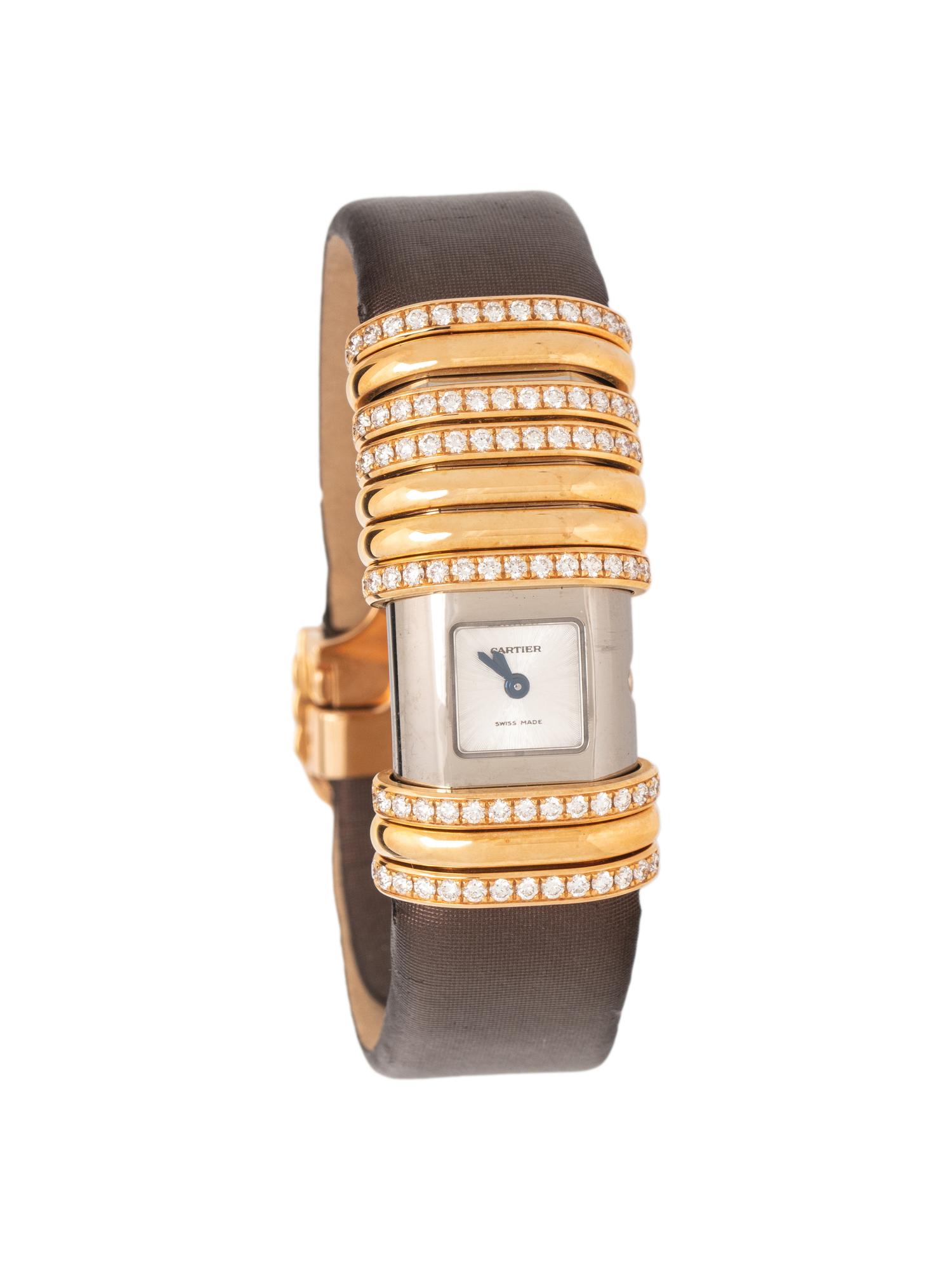 CARTIER, 18K YELLOW GOLD, TITANIUM AND DIAMOND 'DECLARATION' WATCH