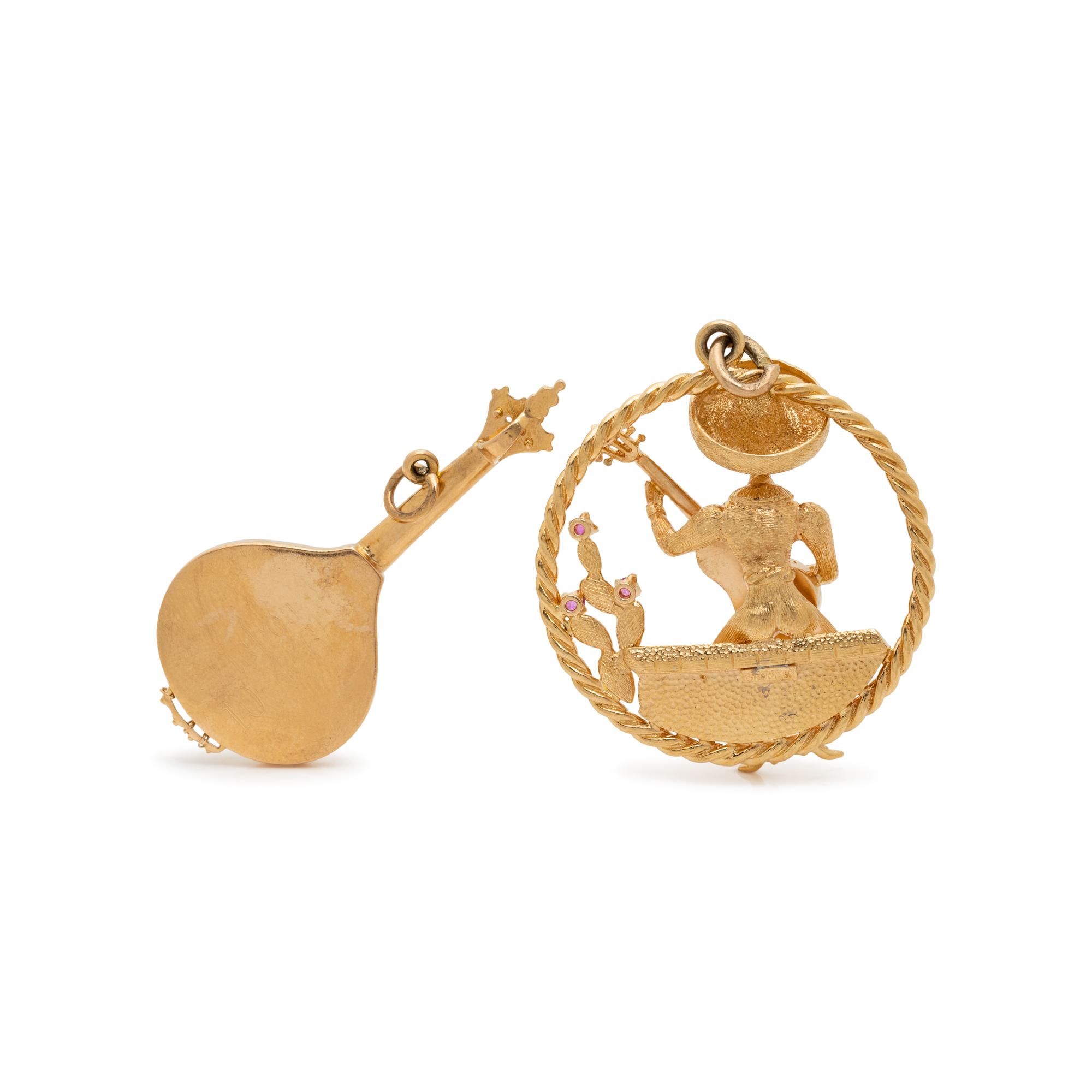 COLLECTION OF YELLOW GOLD MUSICAL CHARMS