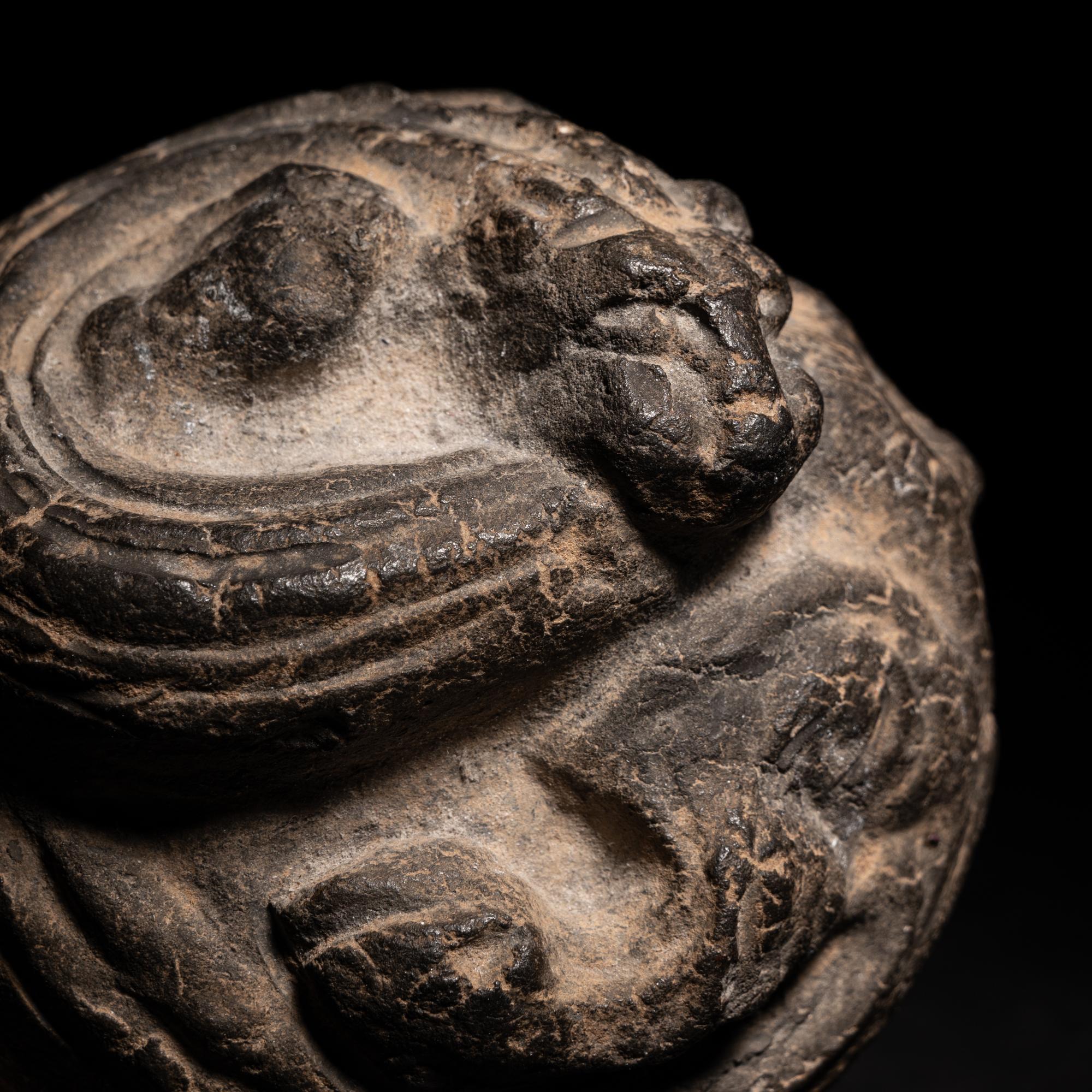A Chinese Grey Pottery Weight