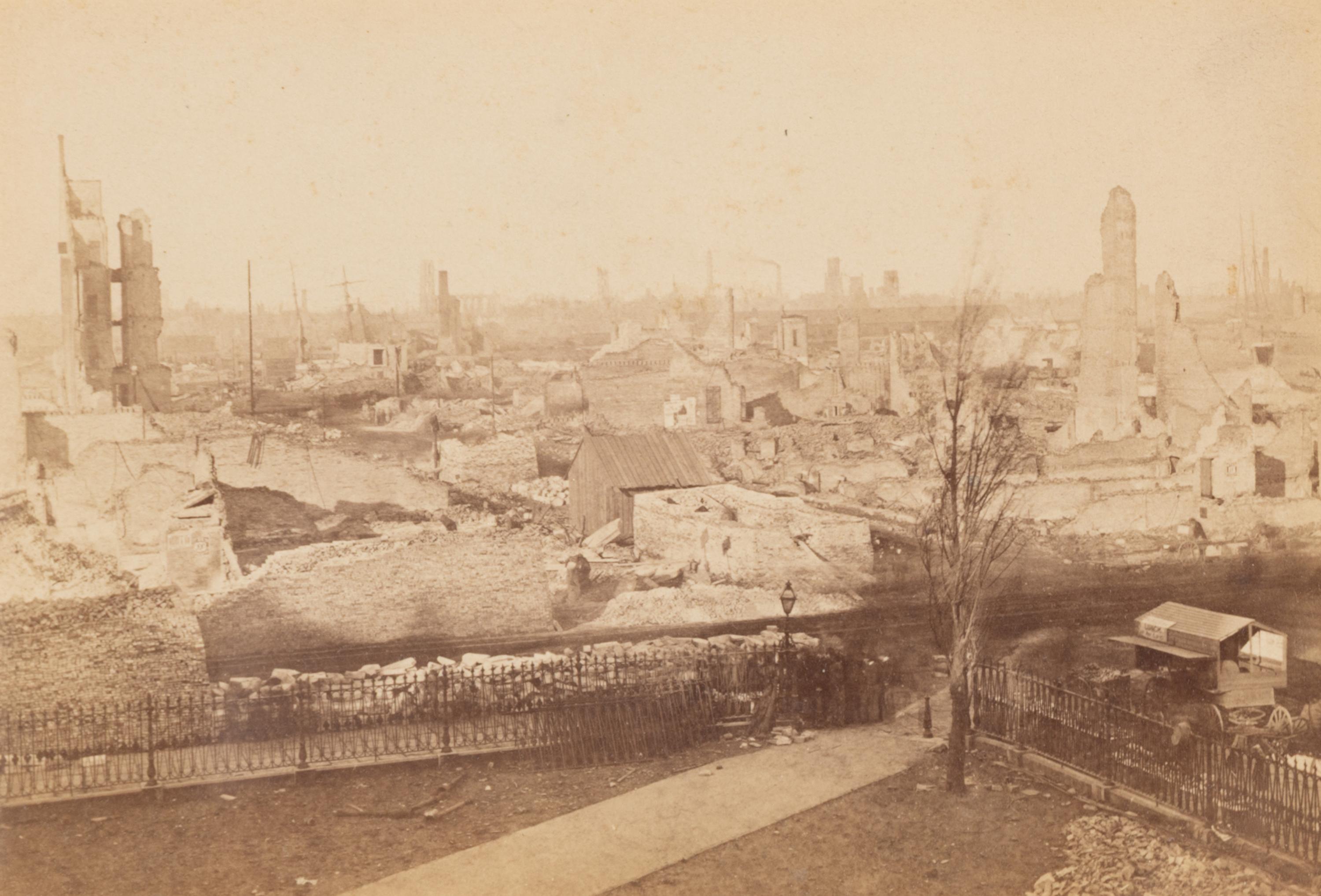 [Chicago Fire]. A group of 7 albumen prints taken before and after the 1871 Chicago Fire, comprising: