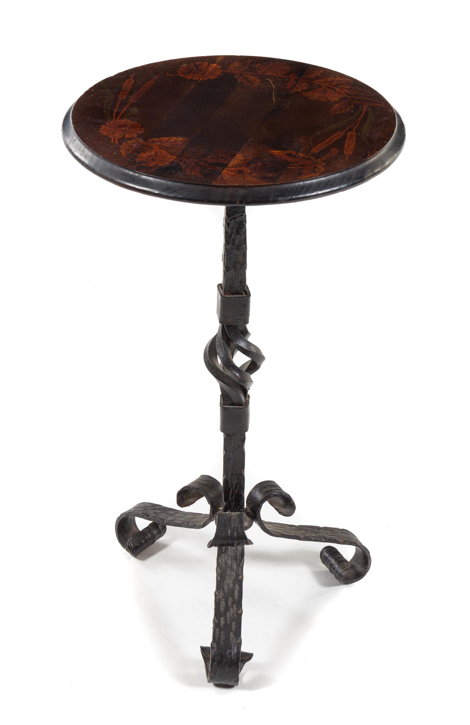 An Italian Marquetry Table Height 25 x diameter of top 14 1/2 inches. — 19TH CENTURY, THE BASE LATER