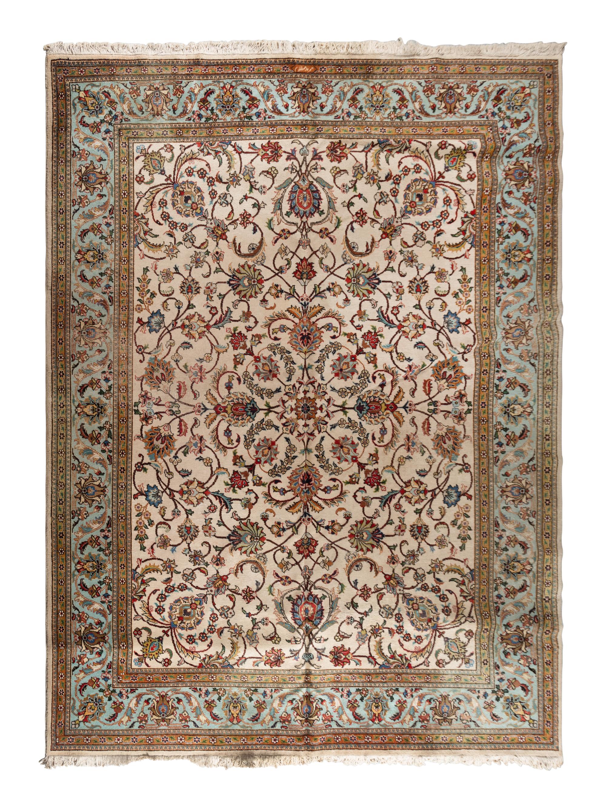 A Tabriz Wool Rug