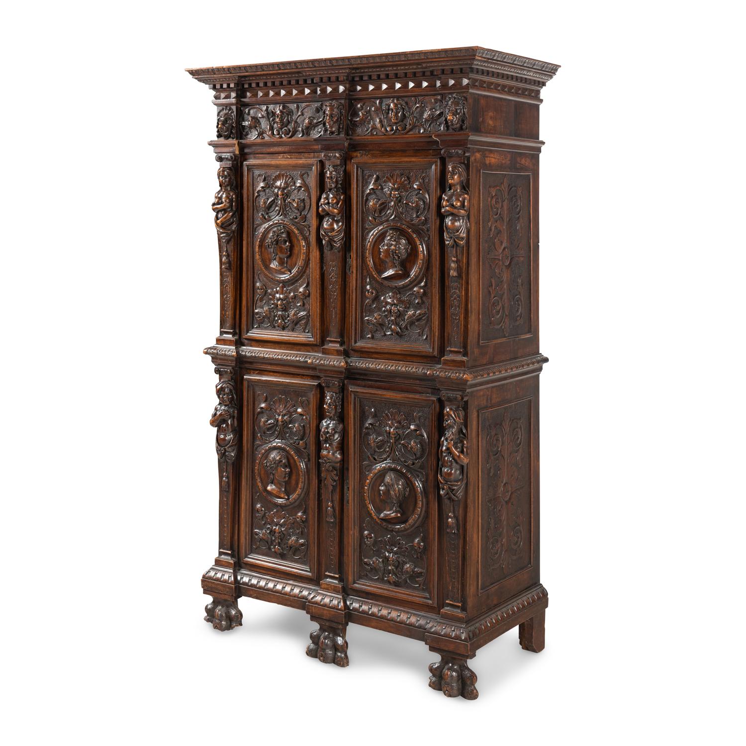 An Italian Renaissance Style Carved Walnut Cabinet