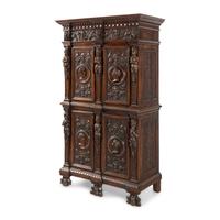 An Italian Renaissance Style Carved Walnut Cabinet