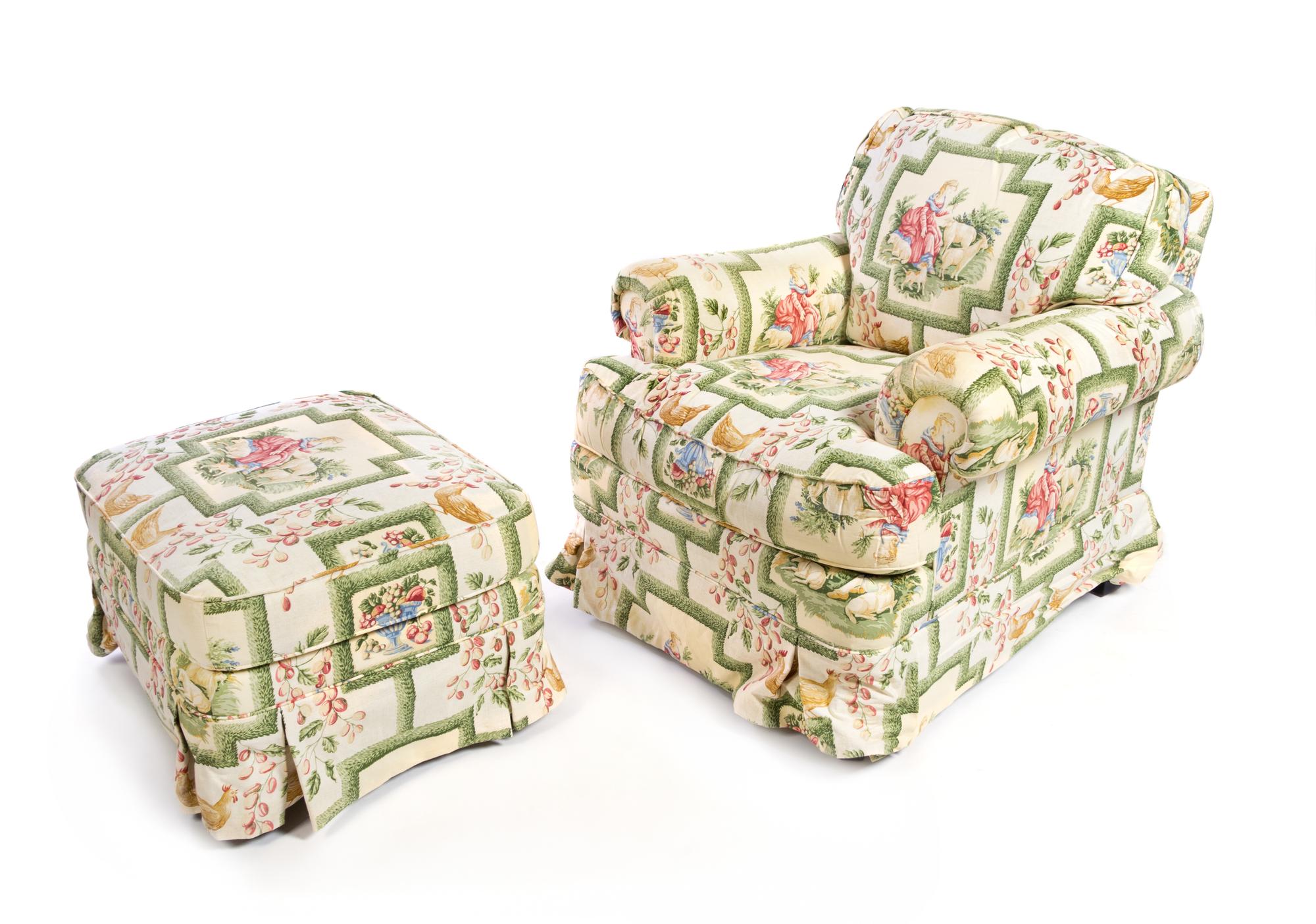 An Upholstered Armchair and Ottoman Height of armchair 32 1/2 inches.