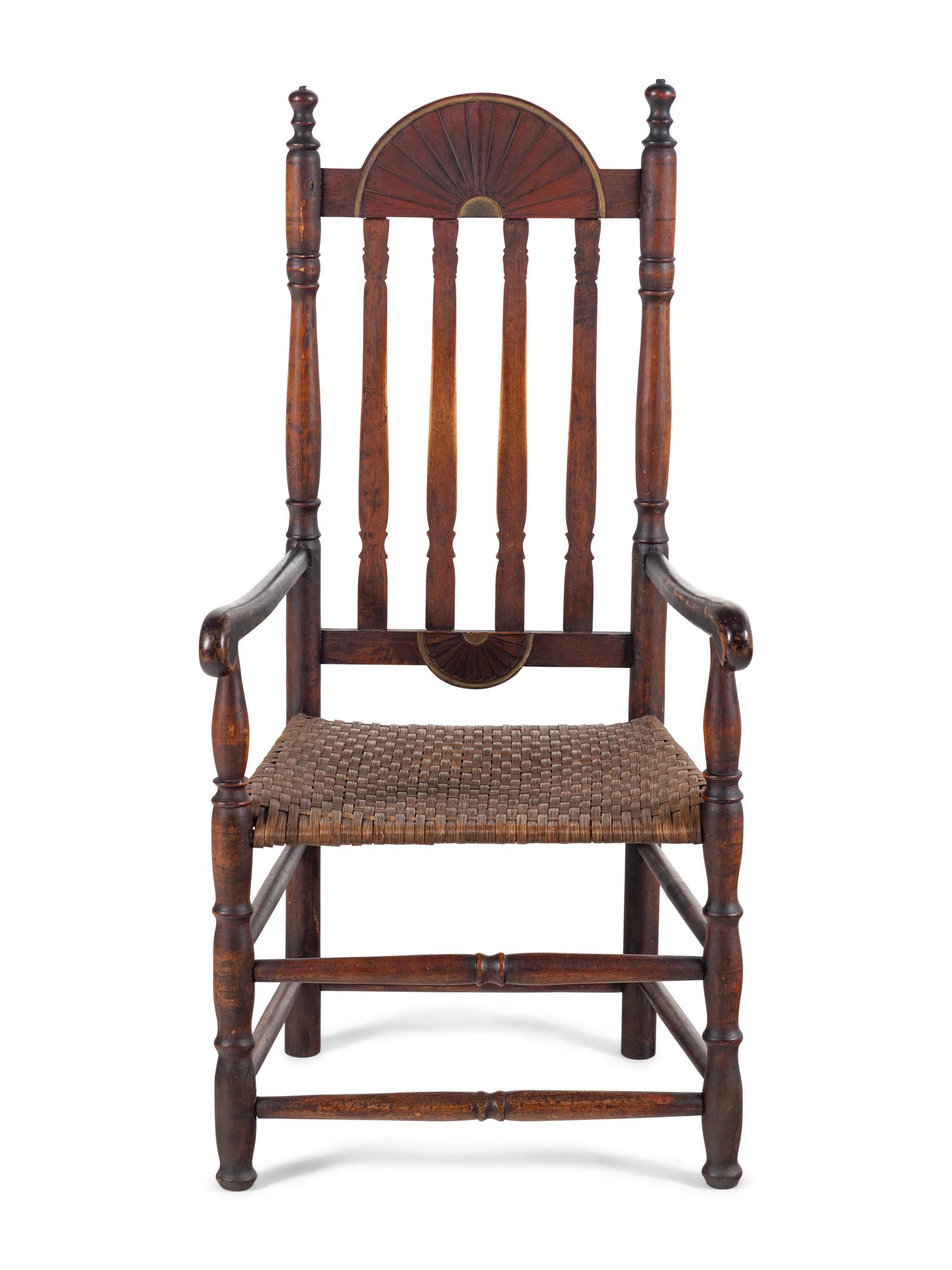 A William and Mary Style Parcel Gilt and Red Painted, Fan-Carved Bannister Back Woven Splint Seat Armchair