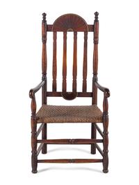 A William and Mary Style Parcel Gilt and Red Painted, Fan-Carved Bannister Back Woven Splint Seat Armchair