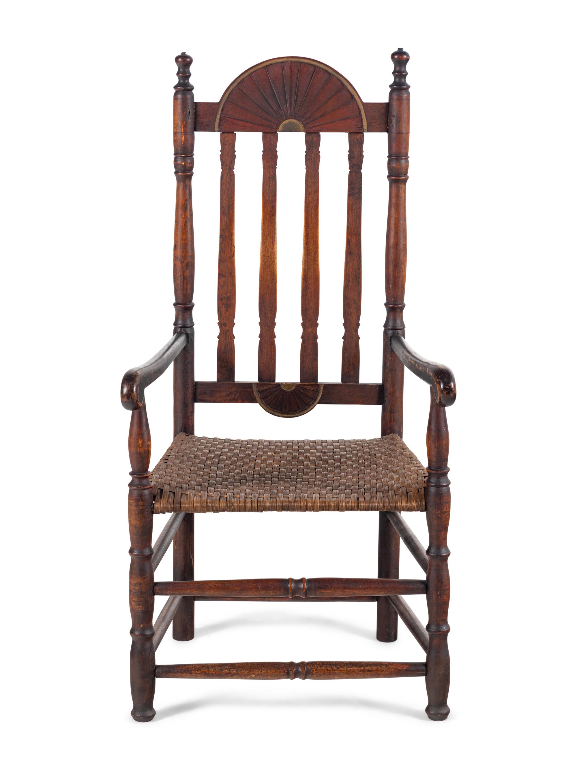 A William and Mary Style Parcel Gilt and Red Painted, Fan-Carved Bannister Back Woven Splint Seat Armchair