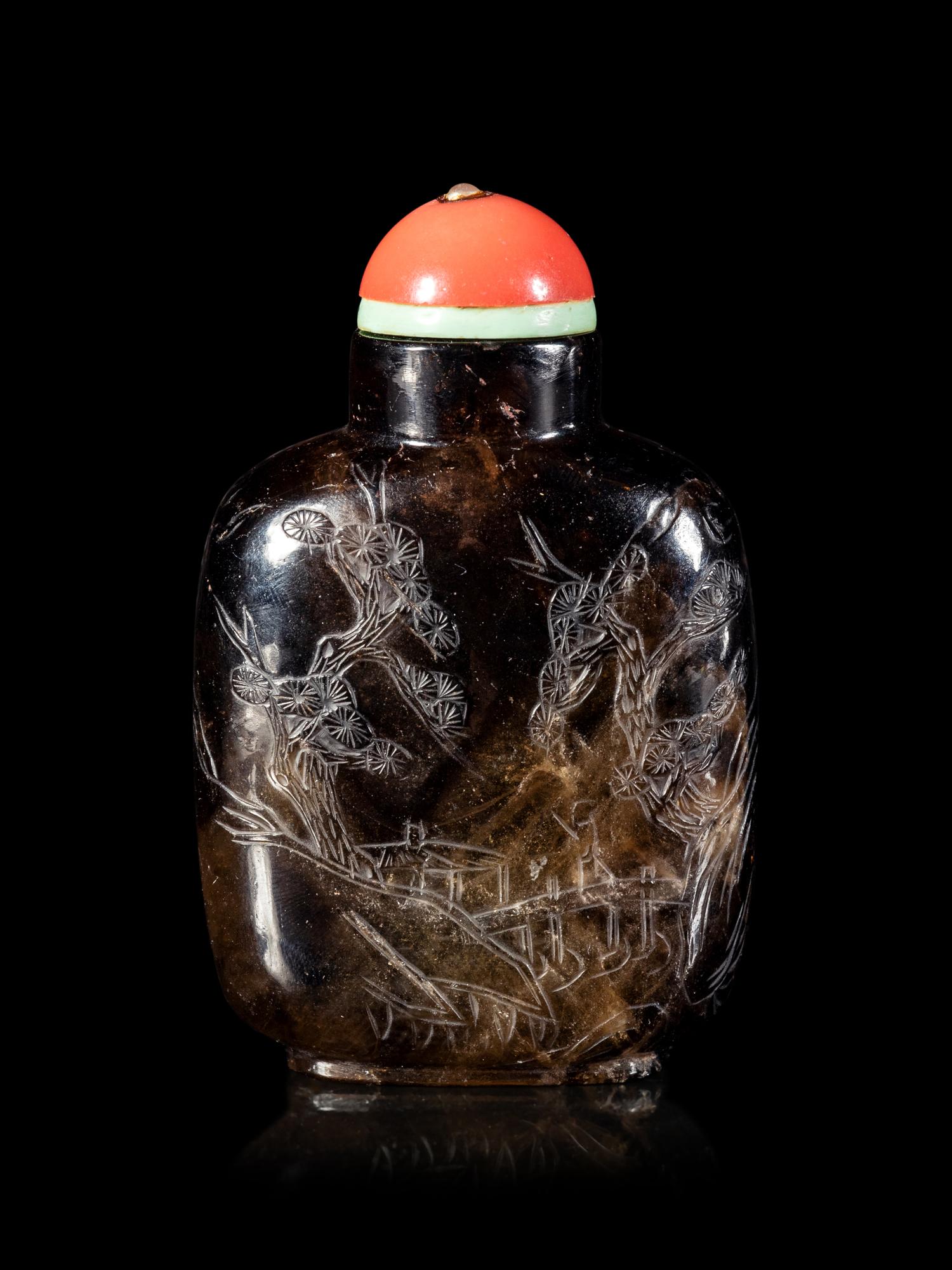 A Carved Smoky Quartz Snuff Bottle