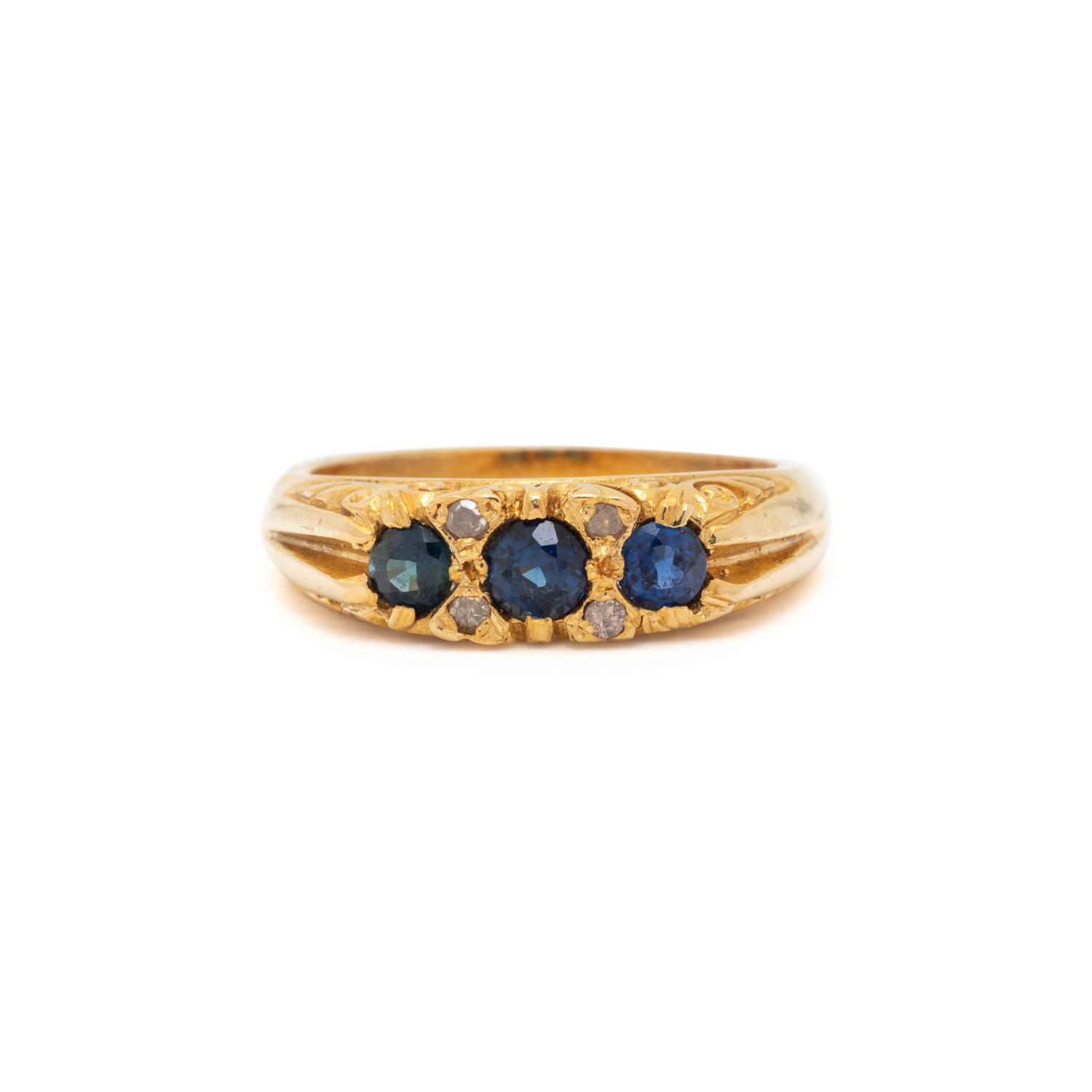 YELLOW GOLD, SYNTHETIC SAPPHIRE AND DIAMOND RING