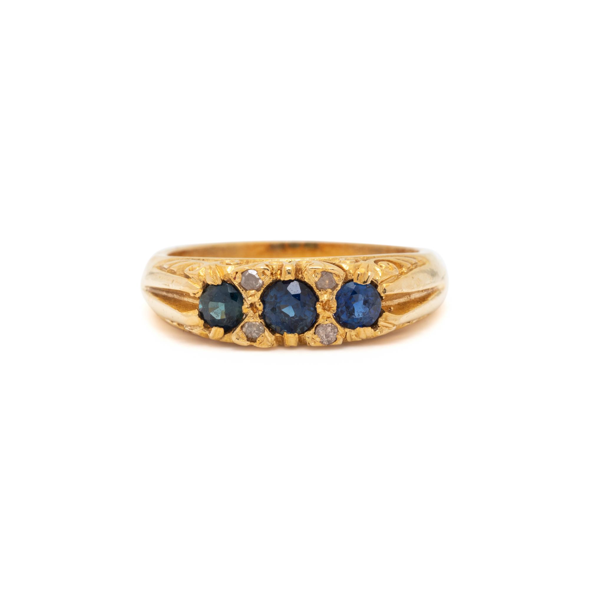 YELLOW GOLD, SYNTHETIC SAPPHIRE AND DIAMOND RING