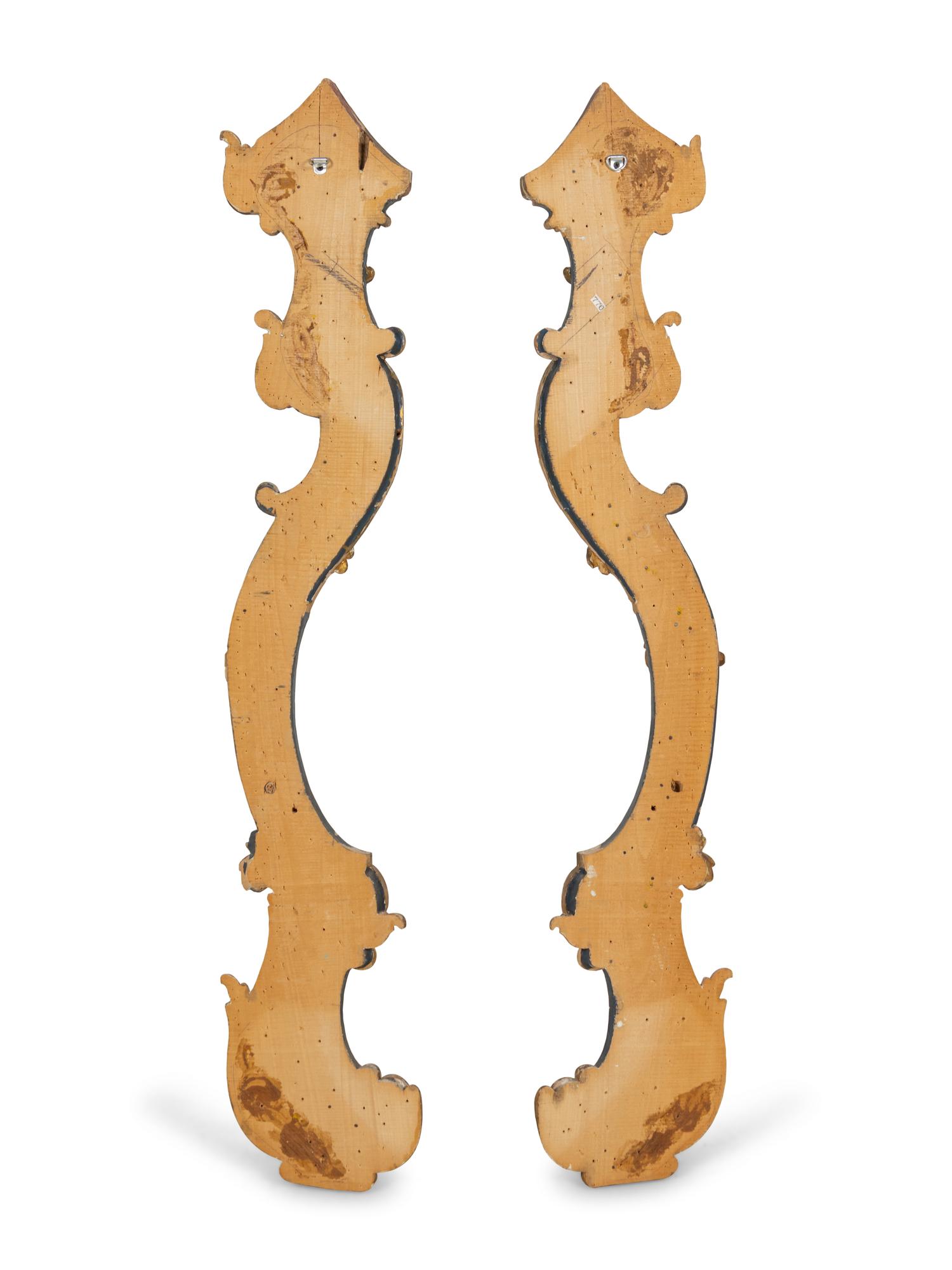 A Pair of Italian Painted and Parcel Gilt Pilasters