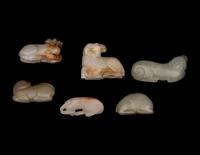 Six Chinese Carved Celadon Jade Figures of Recumbent Animals