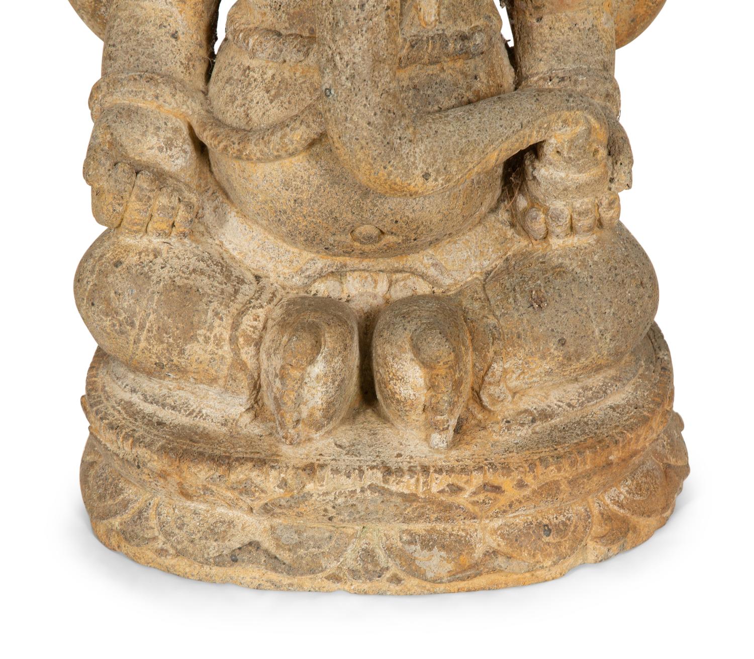 An Indian Cast Stone Figure of Ganesh