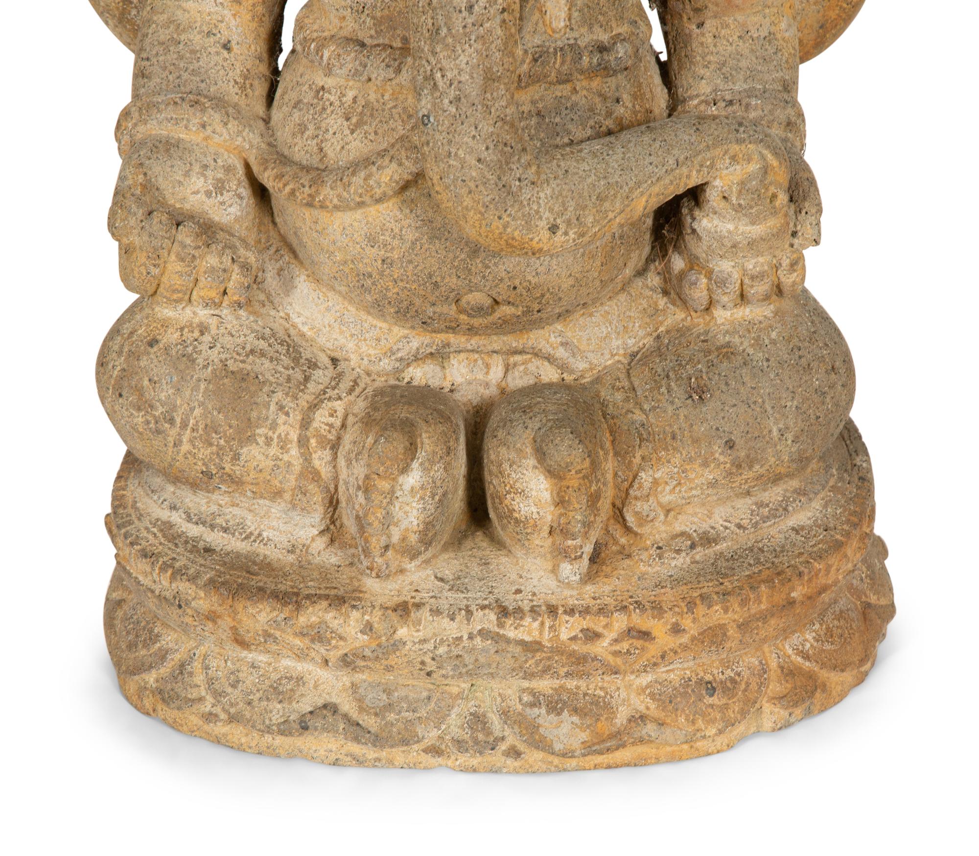 An Indian Cast Stone Figure of Ganesh