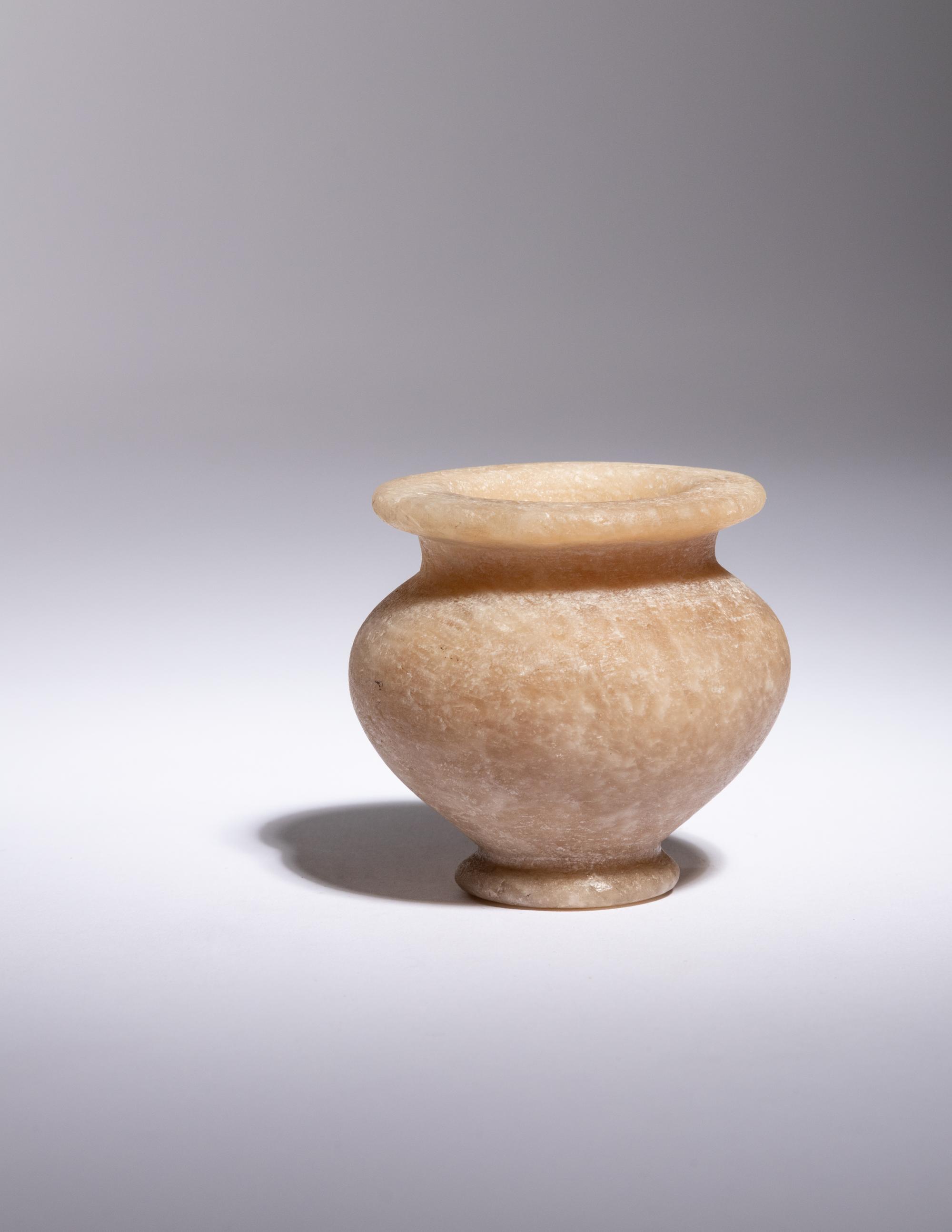 An Egyptian Alabaster Cosmetic Jar
