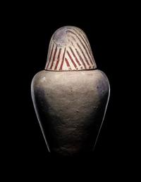 An Egyptian Painted Pottery Canopic Jar