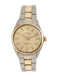 ROLEX, REF. 1005 STAINLESS STEEL AND 18K YELLOW GOLD 'OYSTER PERPETUAL' WRISTWATCH, CIRCA 1972