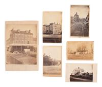 [EARLY PHOTOGRAPHY]. 12 CDVs and cabinet card of Civil War-era businesses and residences.