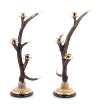 A Pair of Silvered Metal Mounted Antler Three-Light Candelabra