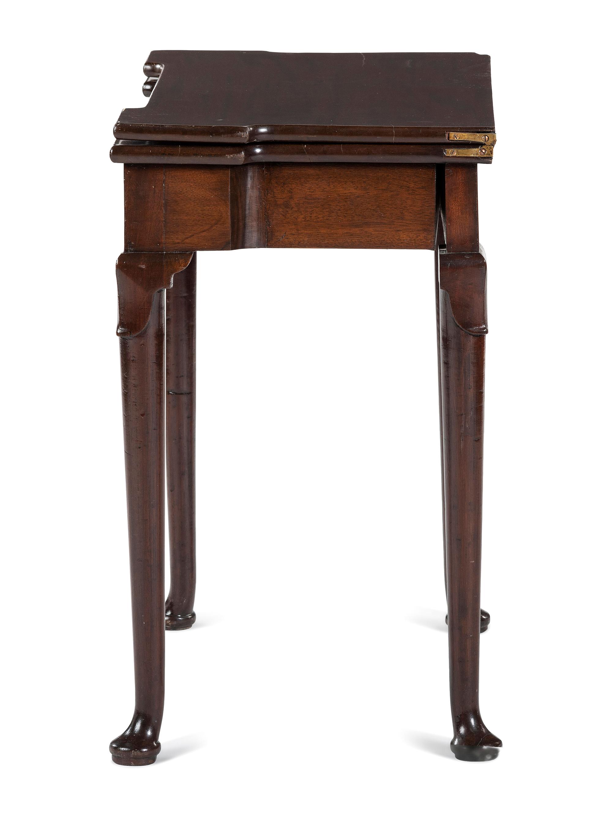 A George III Mahogany Games Table and a Set of Four Queen Anne Style Walnut Dining Chairs