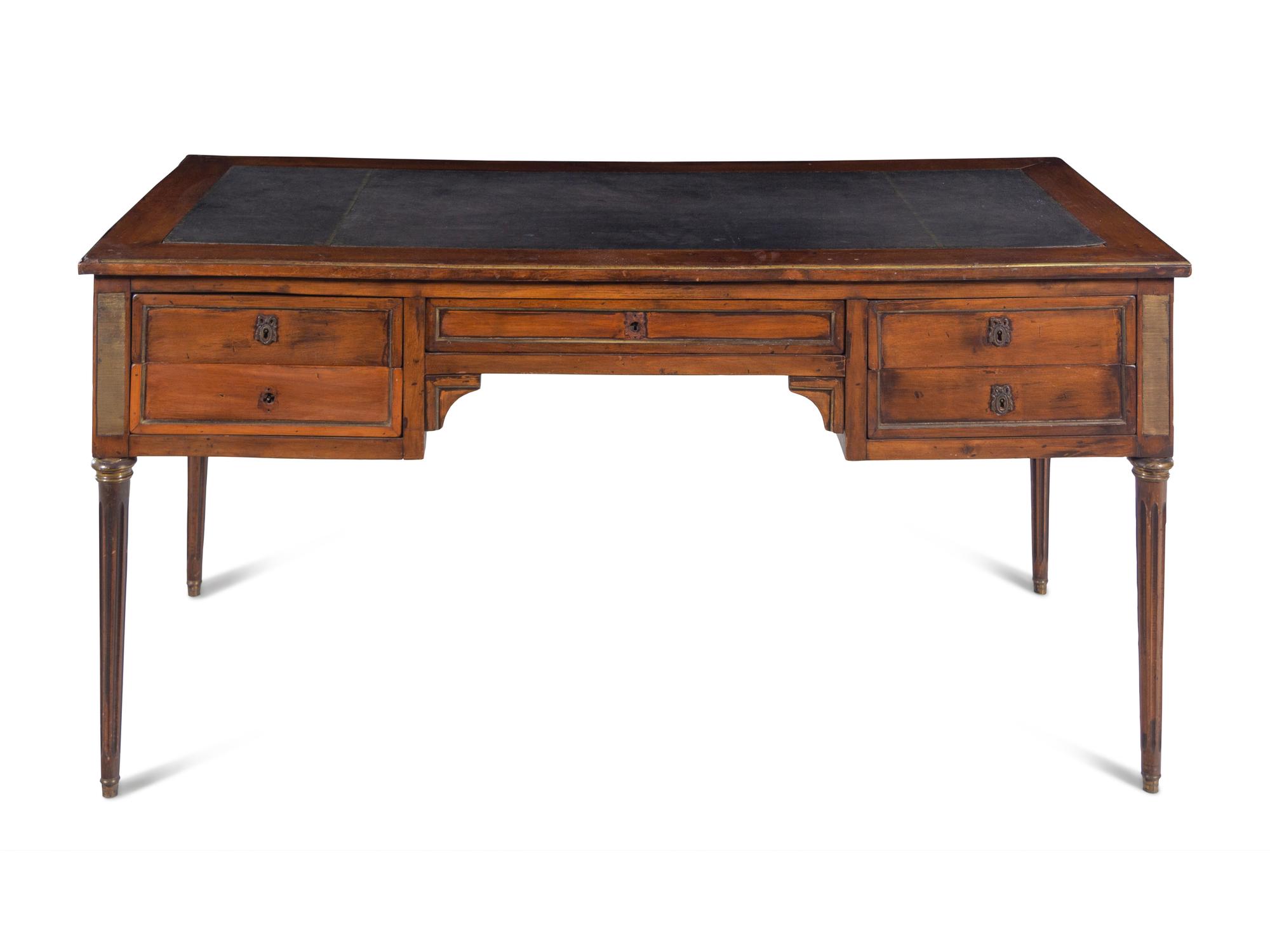 A Louis XVI Style Brass Mounted Walnut Bureau Plat