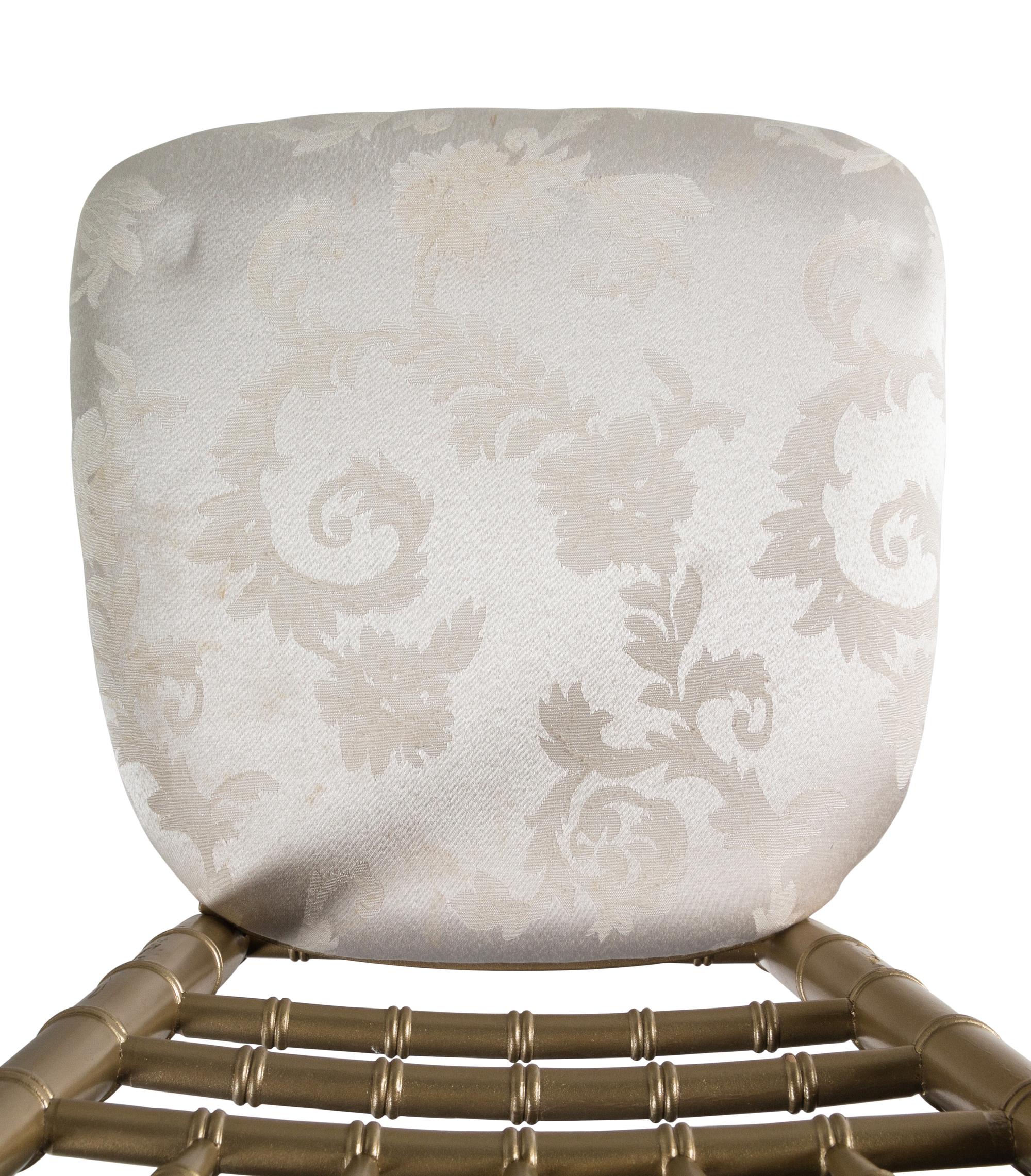 A Set of Thirteen Gold-Painted Ballroom Chairs