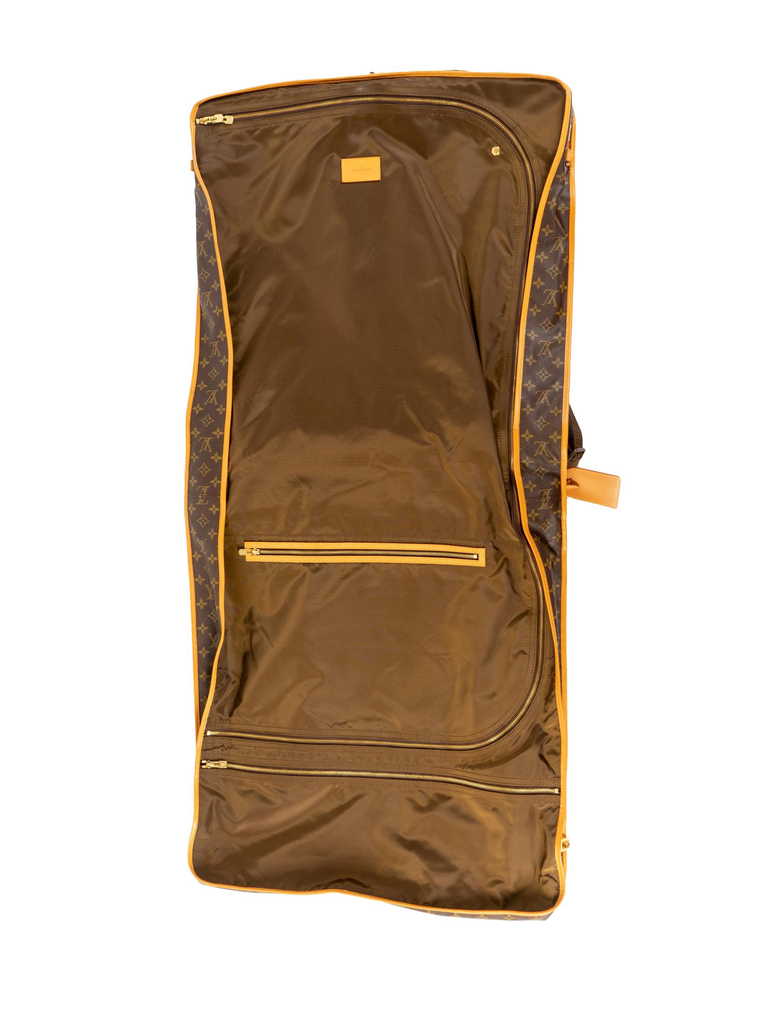 A Louis Vuitton Leather Garment Bag — 20TH CENTURY