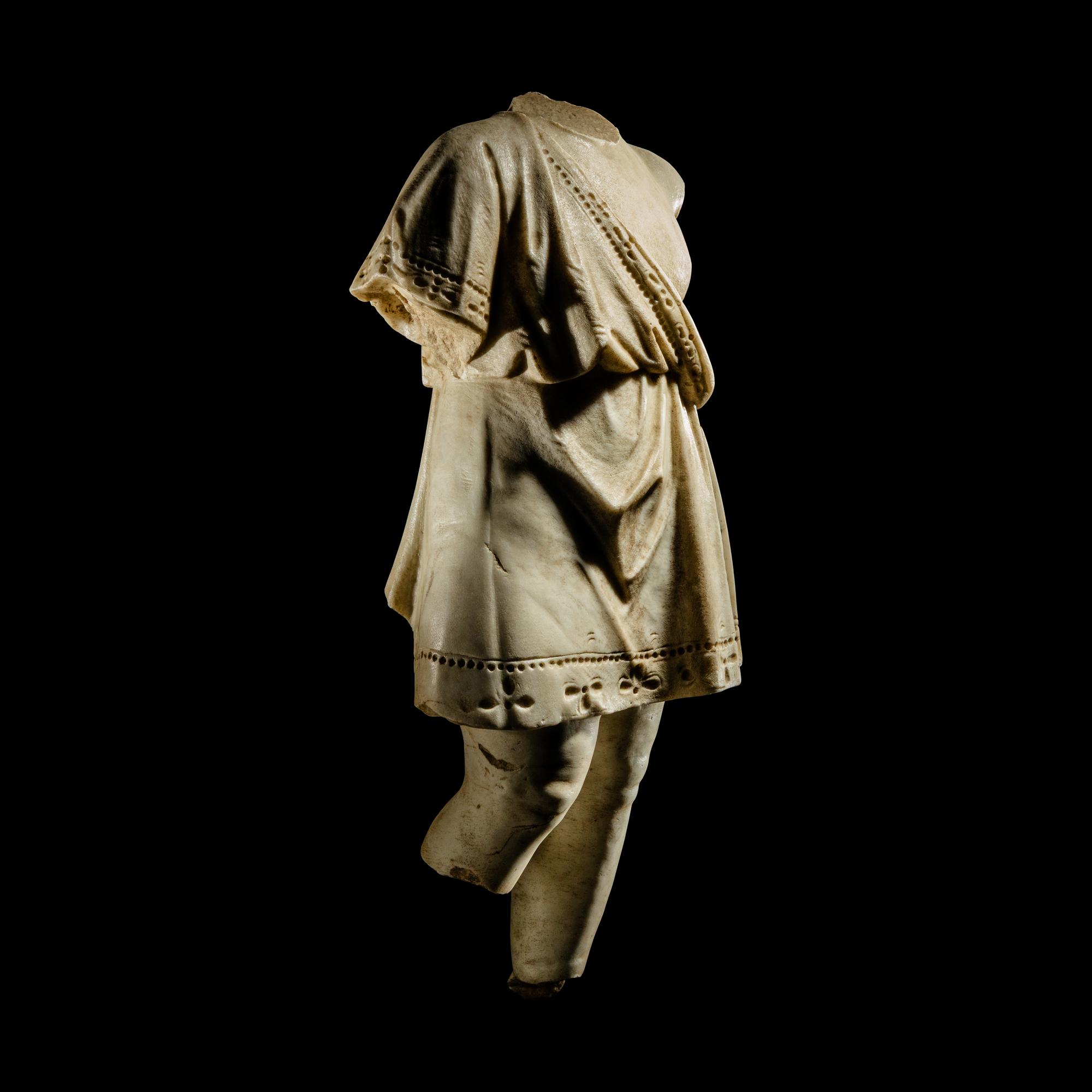 A Roman Style Marble Torso of a Child