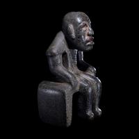 An Olmec Serpentine Seated Figure