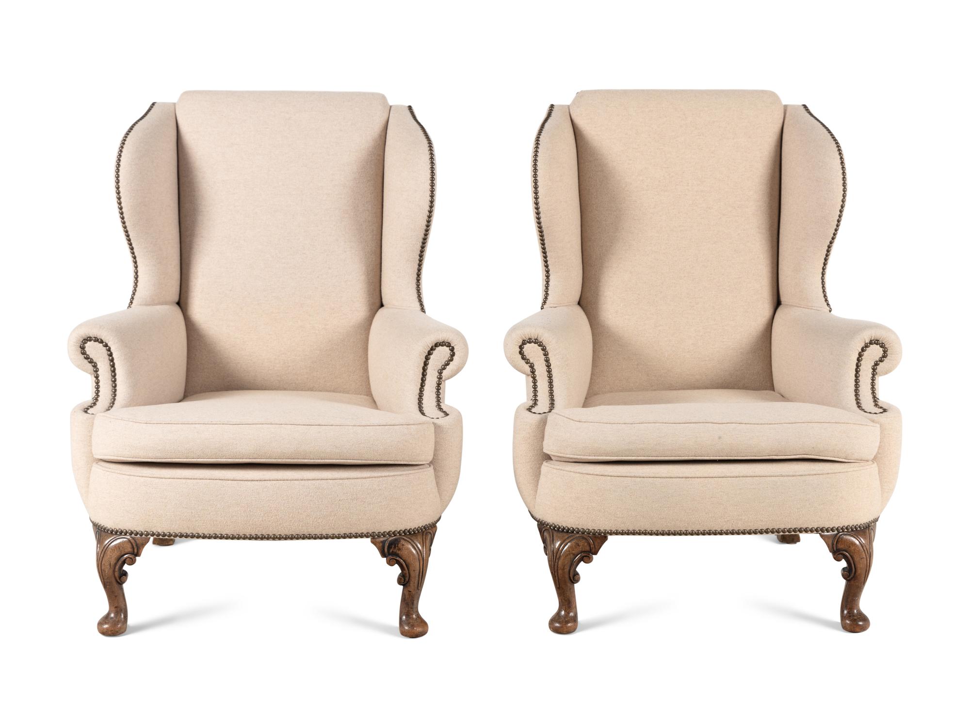 A Pair of Queen Anne Style Wingback Armchairs