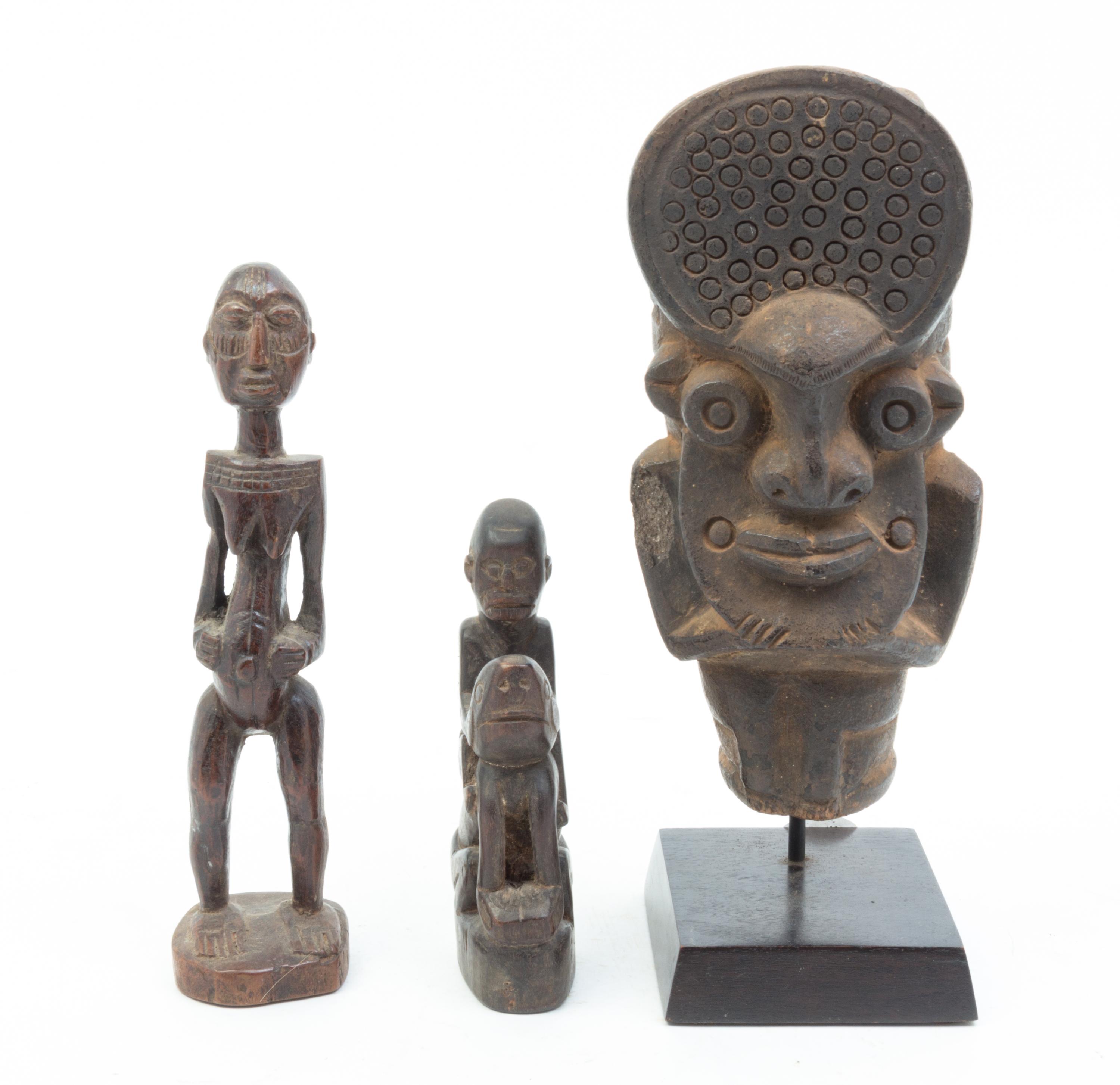 A Group of Four Wood Figures Height of tallest 27 inches.