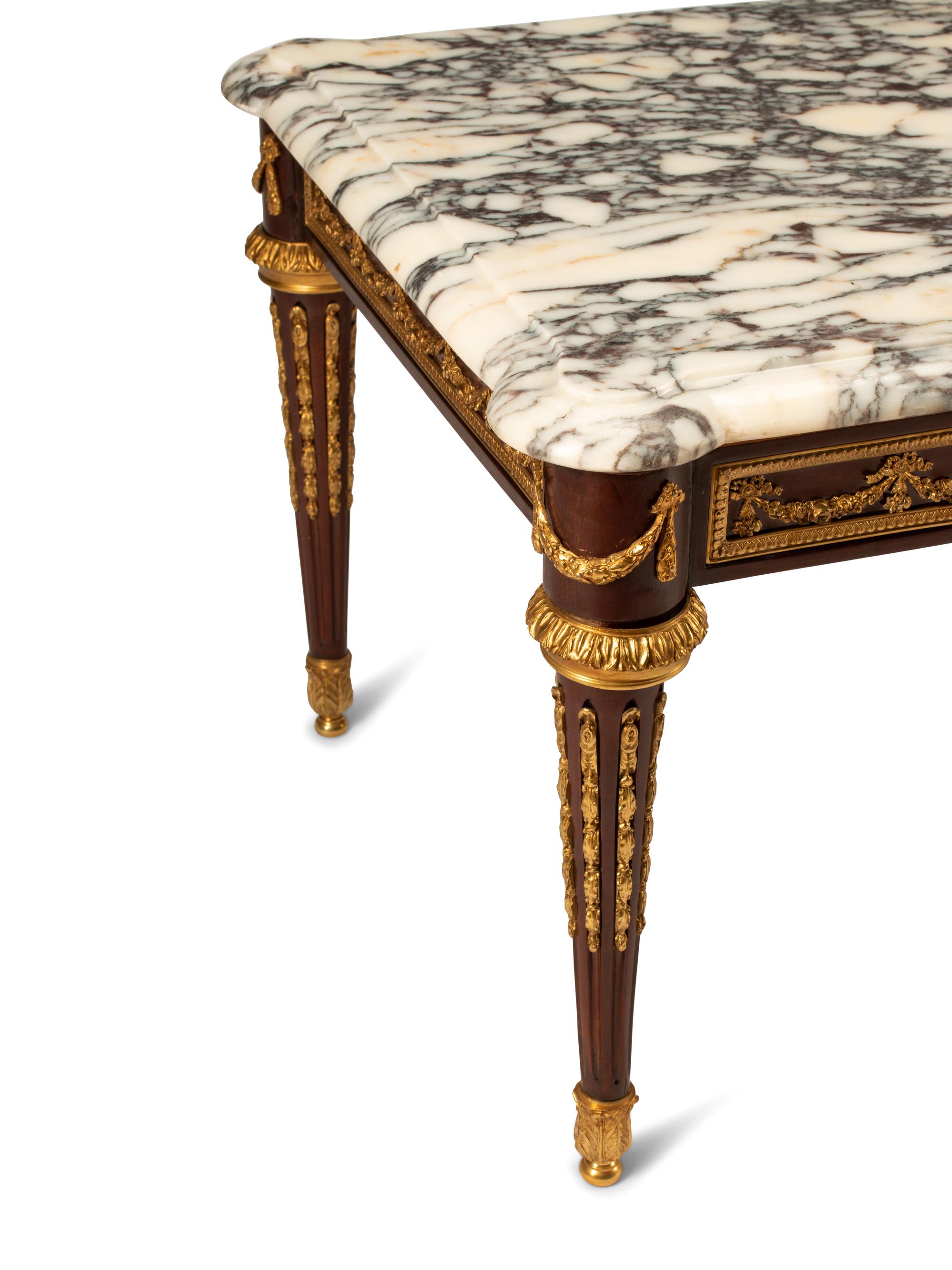 A Louis XVI Style Gilt Bronze Mounted Marble-Top Cocktail Table, 20th Century