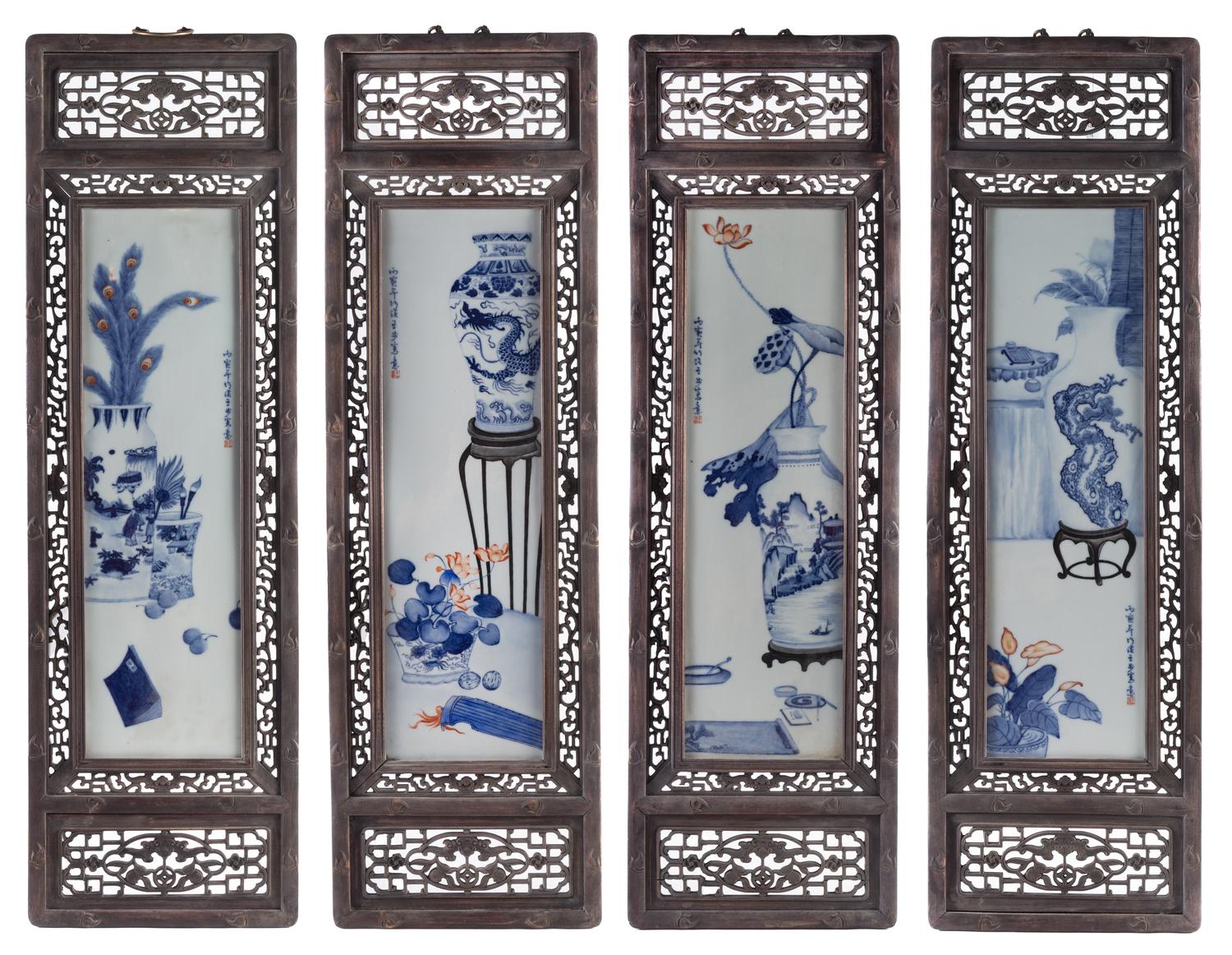 A Set of Four Blue and White Porcelain Plaques Height of each panel 28 3/4 x width 8 1/4 inches.