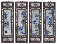 A Set of Four Blue and White Porcelain Plaques Height of each panel 28 3/4 x width 8 1/4 inches.