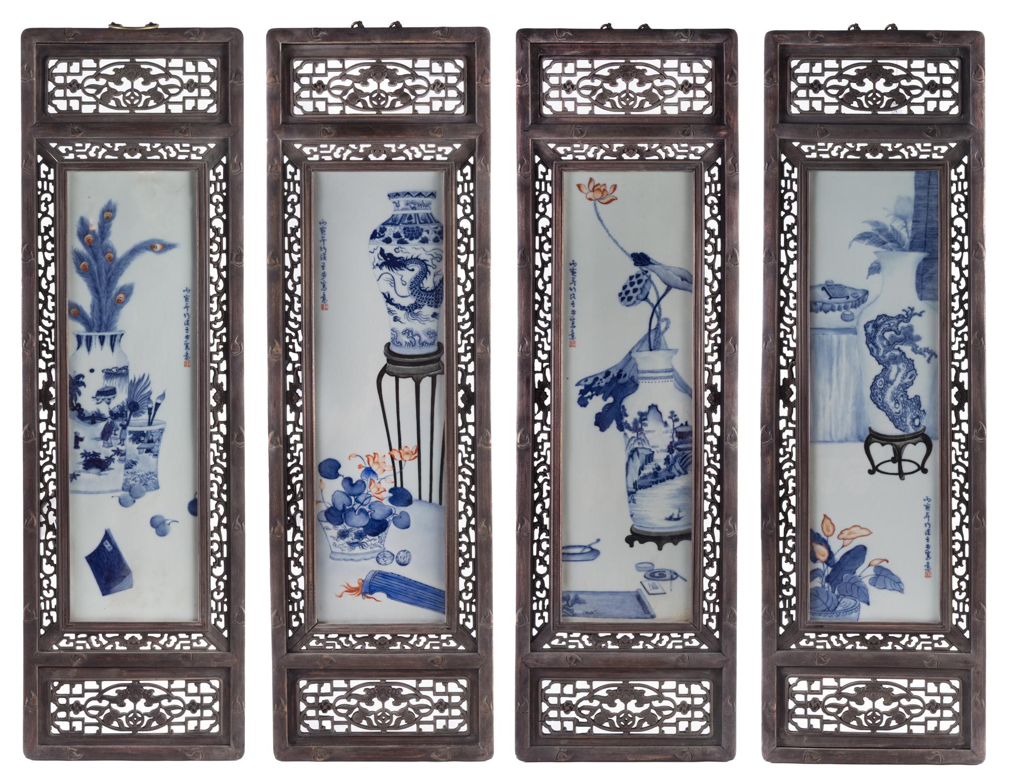 A Set of Four Blue and White Porcelain Plaques Height of each panel 28 3/4 x width 8 1/4 inches.