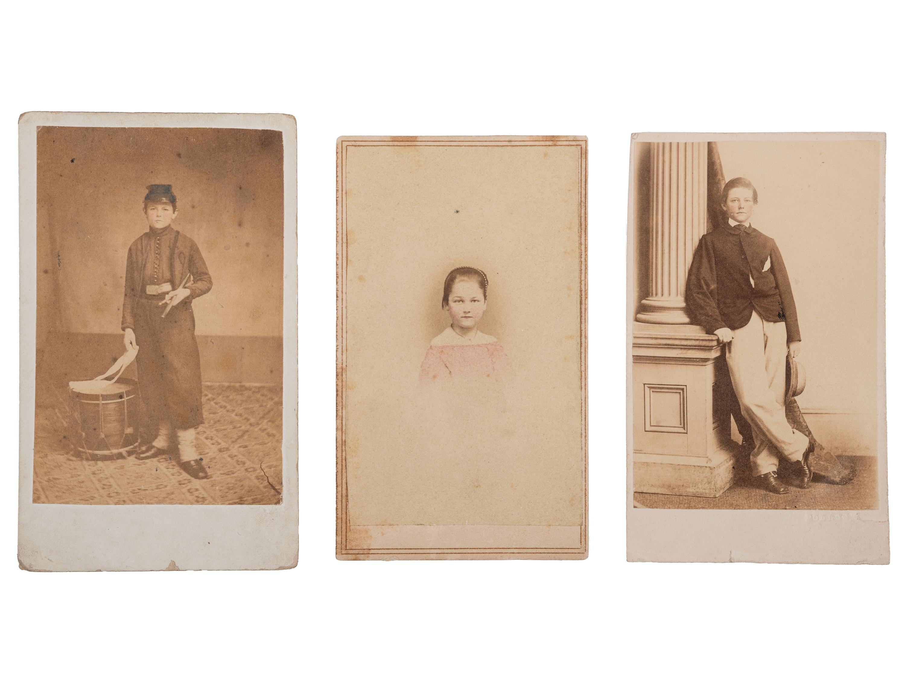 [CIVIL WAR]. A group of 3 CDVs highlighted by 2 portraits of a Union drummer boy displayed under a mat decorated with a hand-drawn patriotic motif.