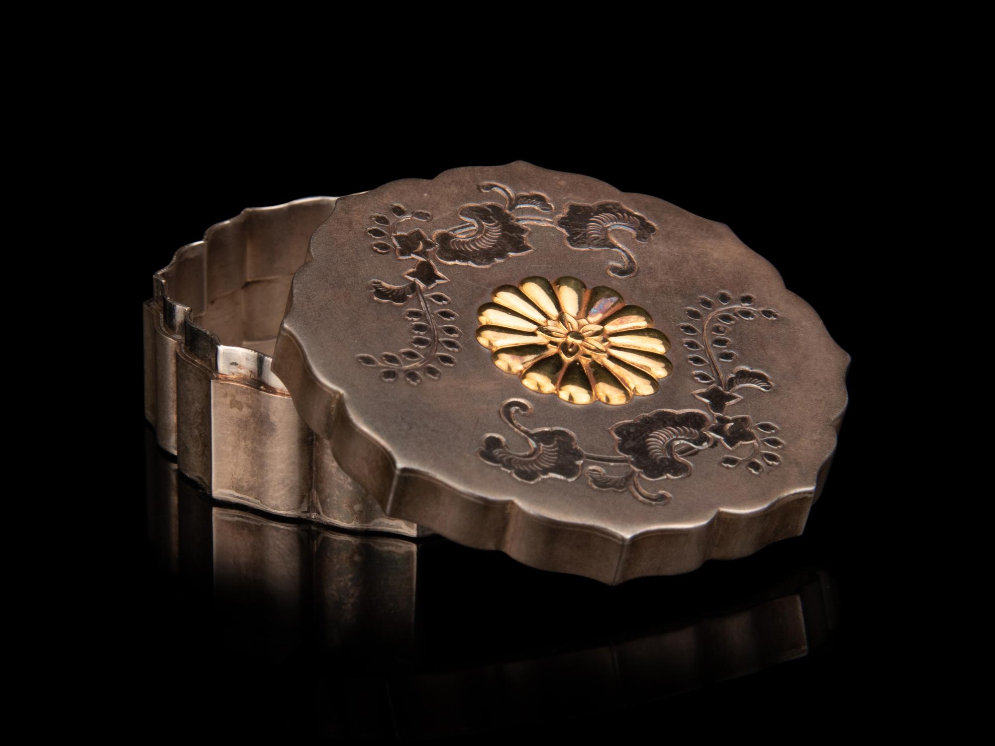 A Japanese Silver Floriform Bonbonnière