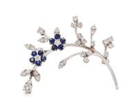 A 14 Karat White Gold, Diamond and Sapphire Flower Motif Brooch,