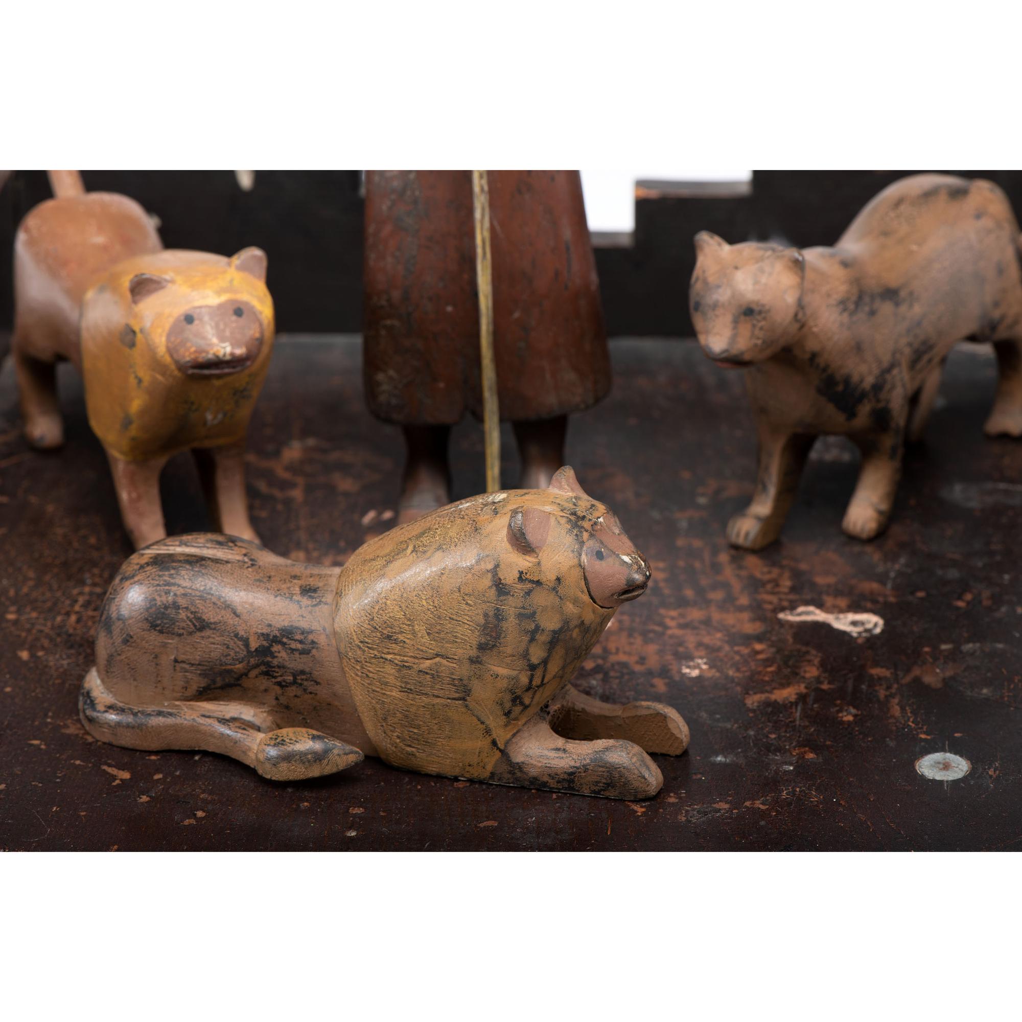 A Carved and Painted Folk Art Group by Steve Armstrong (b. 1945)