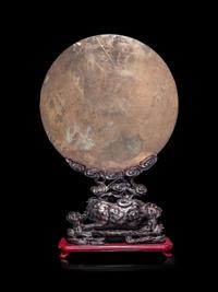 A Large Bronze Mirror