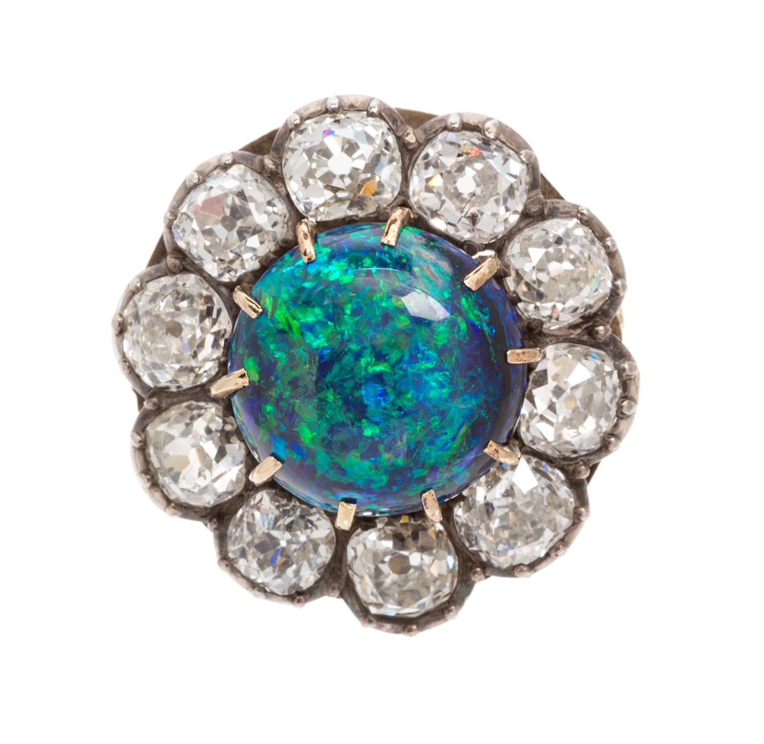 A Victorian Silver Topped Gold, Black Opal and Diamond Ring, 4.60 dwts.