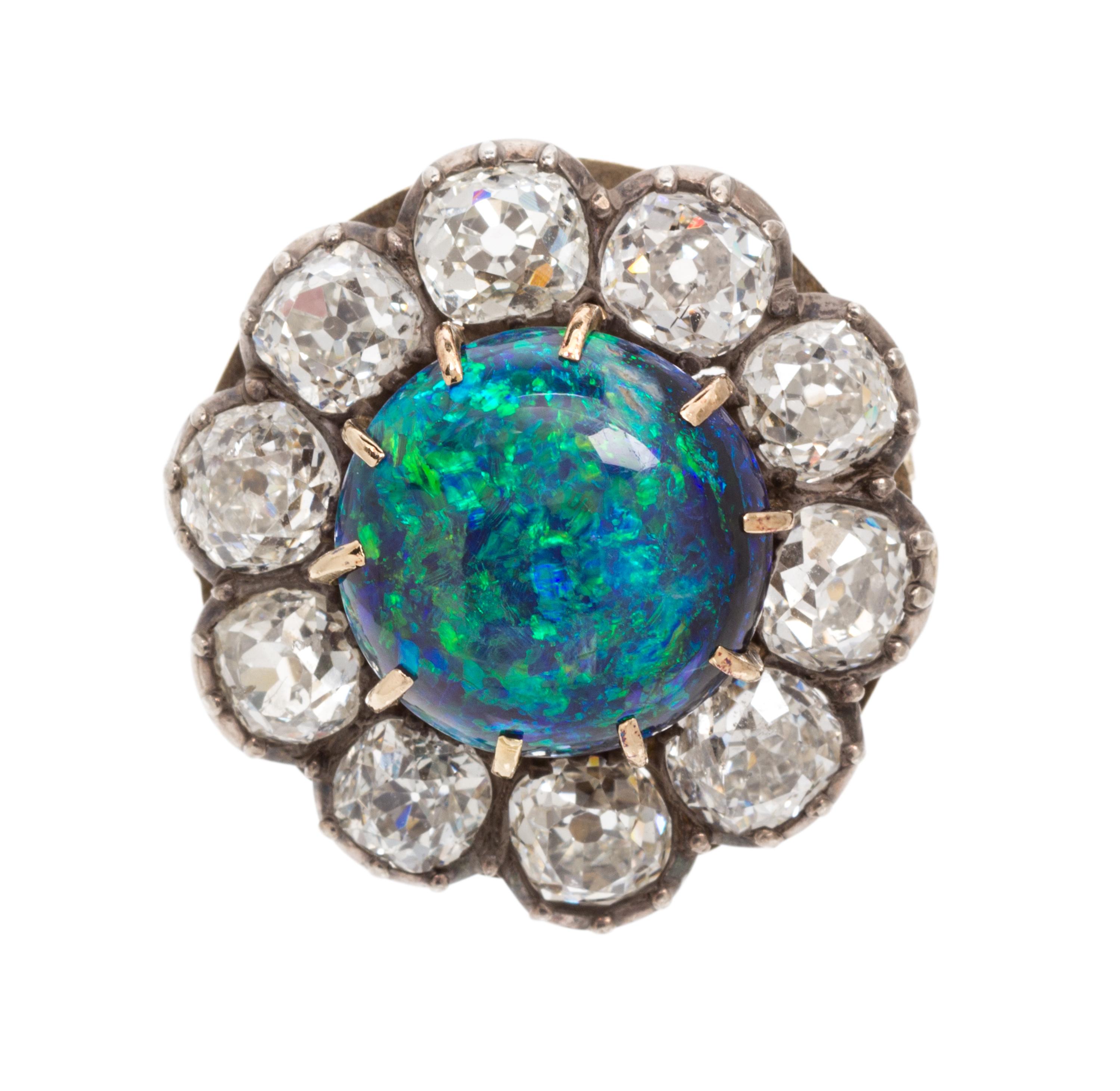 A Victorian Silver Topped Gold, Black Opal and Diamond Ring, 4.60 dwts.