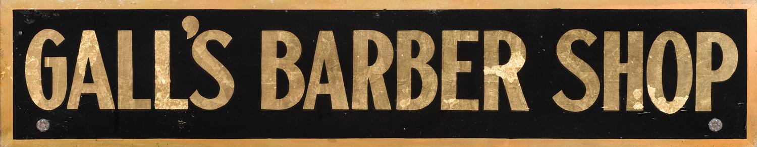 A Reverse Painted and Foil Decorated Barber Shop Sign