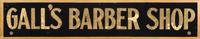 A Reverse Painted and Foil Decorated Barber Shop Sign